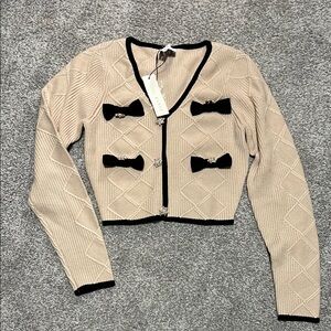 Beige Cardigan with Black Bow Accents
